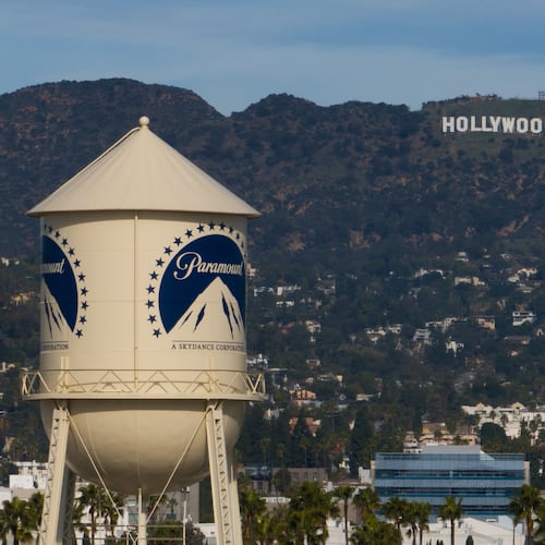 FILE - The Paramount Pictures water tower is seen in Los Angeles, Thursday, Dec. 18, 2025, with the Hollywood sign in the distance. (AP Photo/Jae C. Hong,File)