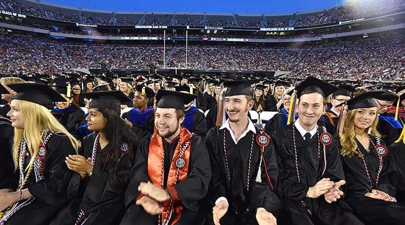 May 10, 2019 Athens - Students react as they listen to commencement speaker Deborah Ann Roberts, news correspondent, during UGA's 2019 spring undergraduate commencement ceremony at Sanford Stadium in Athens on Friday, May 10, 2019. HYOSUB SHIN / HSHIN@AJC.COM
