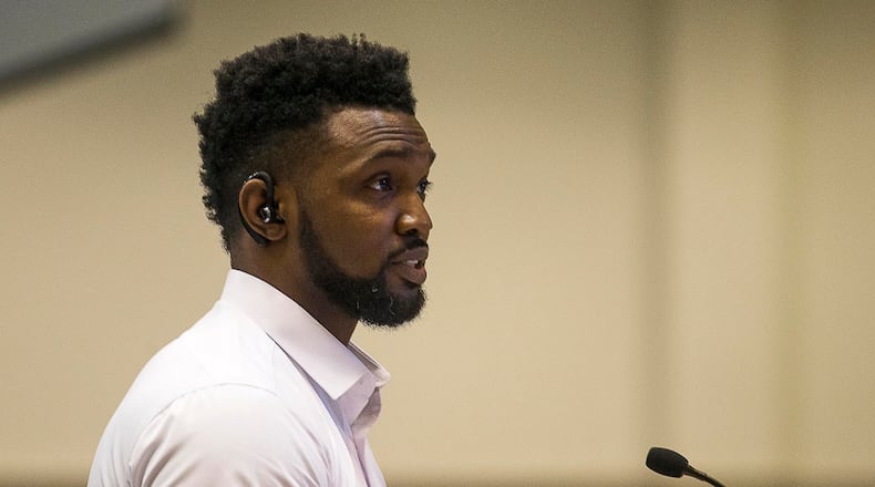 Tristan King, a father of a kindergartner who was left off the school bus three times asks the Gwinnett County Board of Education to fire the principal and others for negligence. He also demanded a written apology from the school district.  (ALYSSA POINTER/ALYSSA.POINTER@AJC.COM)