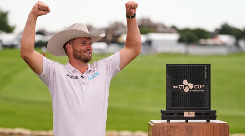 Wyndham Clark celebrates after winning the CJ Cup Byron Nelson golf tournament in McKinney, Texas, Sunday, May 24, 2026. (AP Photo/Tony Gutierrez)