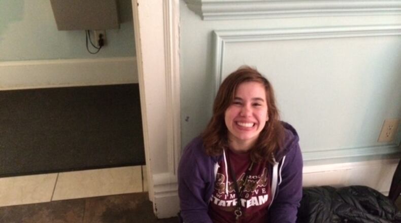 Brenau University freshman Sarah Frey, 18 of Lawrenceville, tries to stay warm in the dining hall after what another freshman Amanda Smith, 18 of Cumming, described as a "freezing" night on the Gainesville campus."Lots of blankies," said freshman Ella Kleinschmidt, 19 of Australia, who noted it doesn’t get this cold home Down Under/Steve Visser, ajc.com