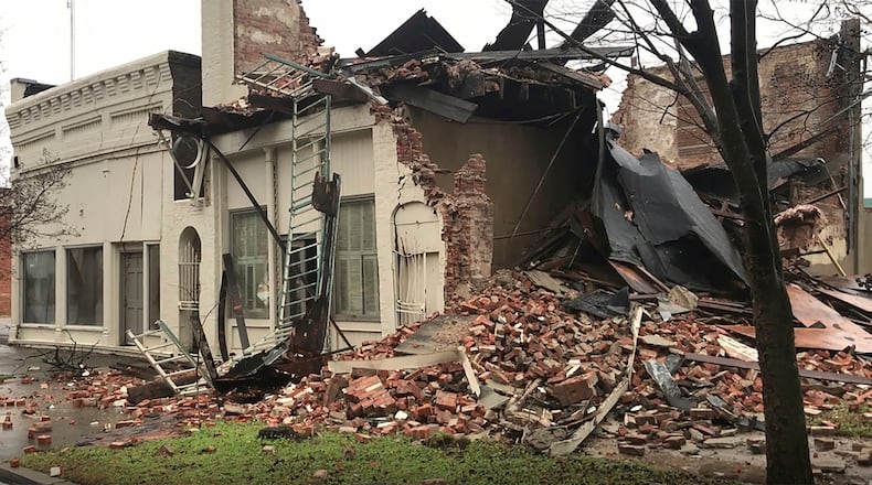 In this image taken from video, severe storms sweeping across parts of the U.S. South were blamed for deaths and destruction, Saturday, Jan. 11, 2020, including the destruction to this downtown Greenville, Miss., building as shown in this video frame grab. The storms are blamed for a number of deaths, as high winds, tornadoes and unrelenting rain battered a large area of the South. (Faith Alford/WABG via AP)