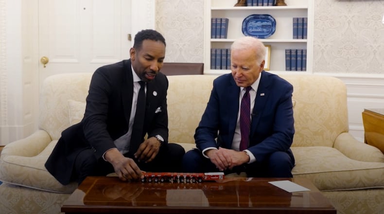 Atlanta Mayor Andre Dickens visits with President Joe Biden in the Oval Office to discuss infrastructure improvements made in the city with the help of federal funding. Courtesy of White House