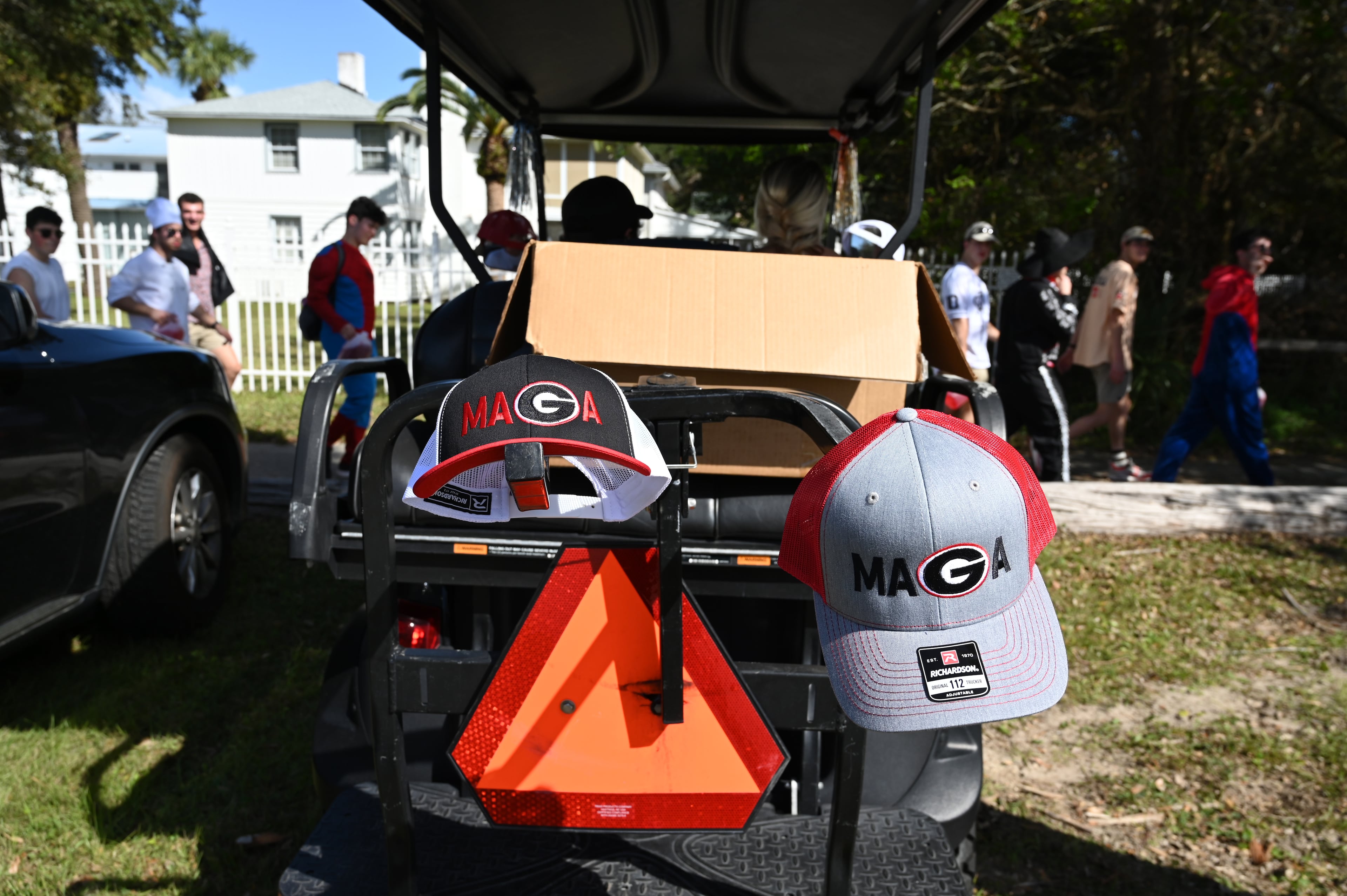 UGA students with Halloween costumes arrive for the annual “Frat Beach” party to celebrate before the annual Georgia-Florida football game on St. Simons Island, Friday, November 1, 2024. On the weekend of the Georgia-Florida football game, St. Simons Island’s East Beach becomes “Frat Beach,” an open-air party teeming with thousands of college students. (Hyosub Shin / AJC)