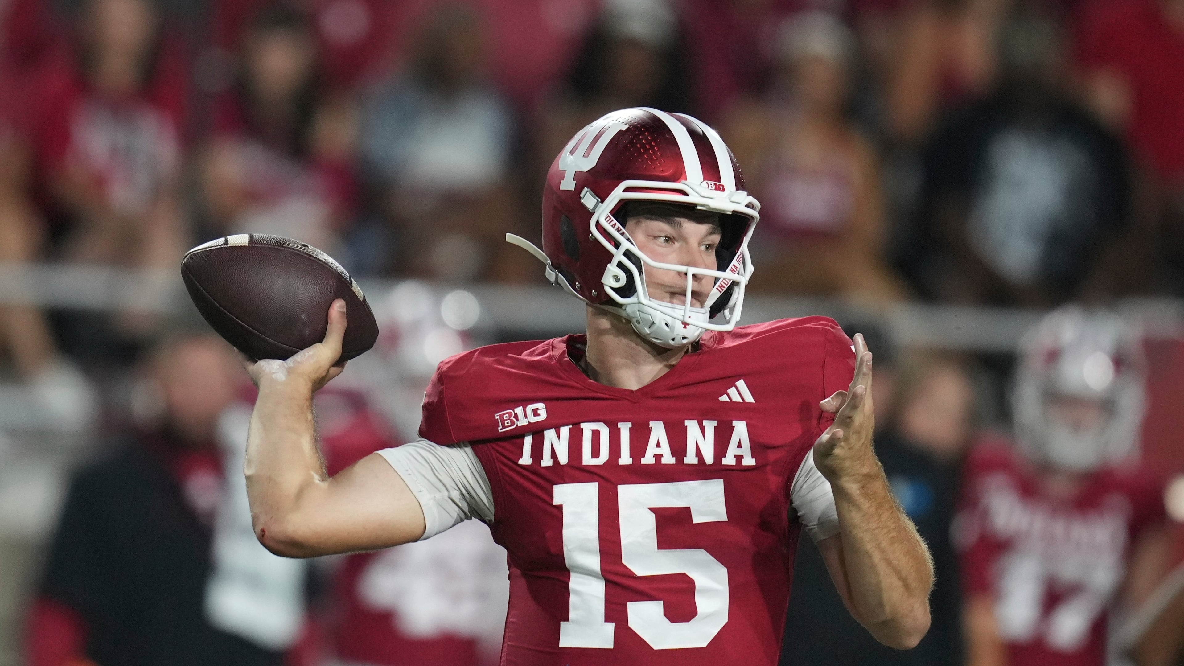 Indiana quarterback Fernando Mendoza throws during the first half of an NCAA college football game against Illinois, Saturday, Sept. 20, 2025, in Bloomington, Ind. (AP Photo/Darron Cummings)