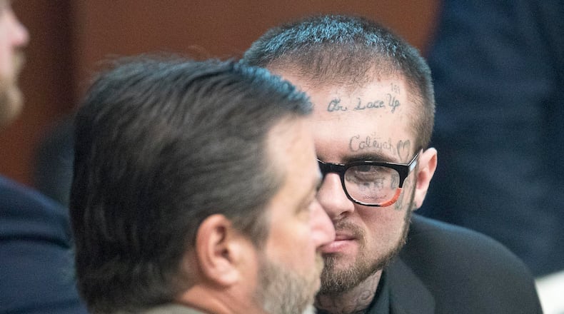 05/13/2019  -- Covington, Georgia -- Christopher McNabb (right) speaks with his lawyer Anthony Carter (left) during his and Cortney Bell's murder trial in front of Georgia Chief Superior Court Judge John M. Ott at the Newton County Courthouse in Covington, Monday, May 13, 2019. (ALYSSA POINTER/ALYSSA.POINTER@AJC.COM)
