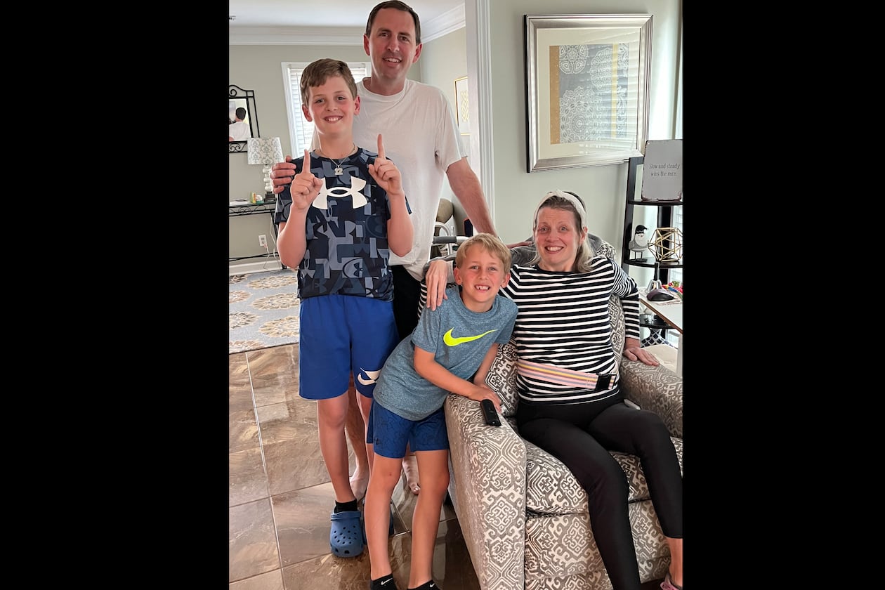As Rachel Blackman battles a mystery illness, she remains steadfast in her role as a mother to sons Peyton, 11, and Cameron, 7, shown with their dad and her husband Brad.