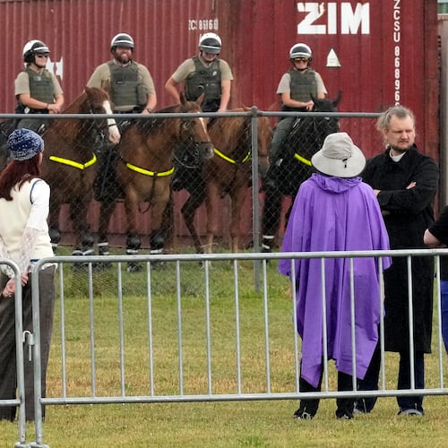 Guards on horses are posted next to the area reserved for people opposed to the death penalty outside Riverbend Maximum Security Institution before the scheduled execution of Tony Von Carruthers Thursday, May 21, 2026, in Nashville, Tenn. (AP Photo/Mark Humphrey)