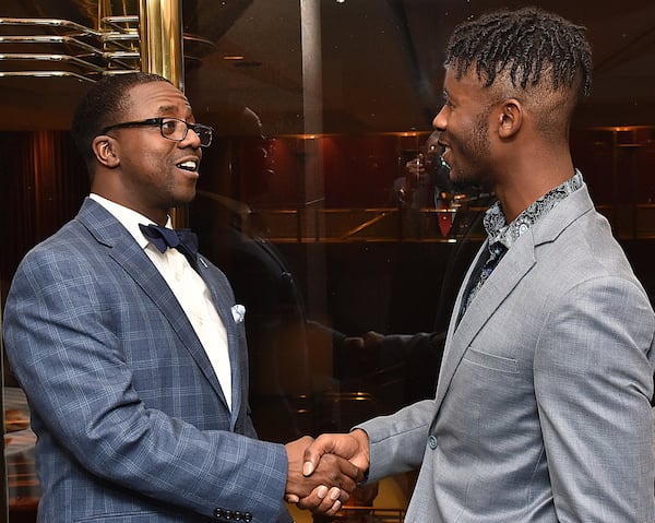About a dozen former interns, including Morehouse student Qualon Bobbitt (right), turned out last week to see Clyde Mize sworn in as president of the Gate City Bar Association. Bobbitt is a beneficiary of the diversity program Mize founded at Morris, Manning & Martin to encourage minority students to pursue law degrees. CONTRIBUTED BY DON MORGAN PHOTOGRAPHY