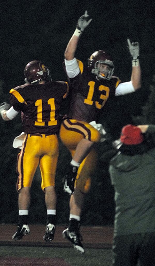 While at Lassiter, Phillip Lutzenkirchen (13) had more than 1,000 receiving yards. (AJC file)