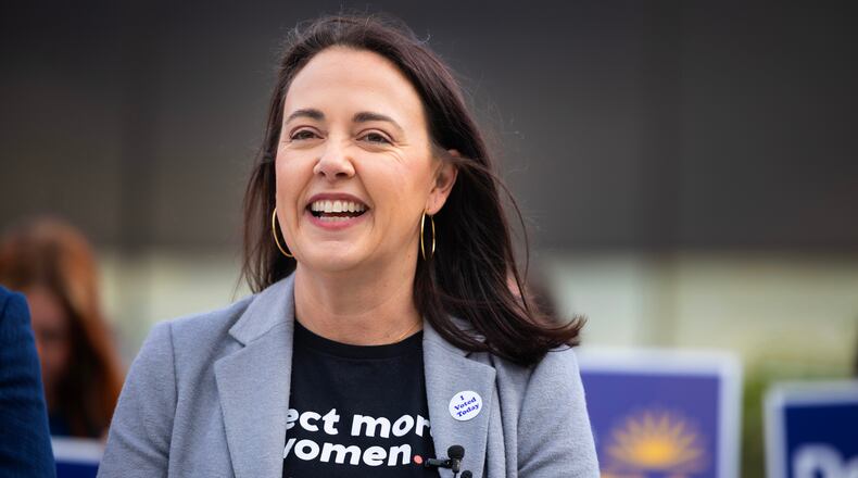 Denise Powell, candidate for the Democratic nomination to the House of Representatives in Nebraska's second district, speaks to the media after casting her ballot in the Nebraska Primary Election at Omaha Community Playhouse Tuesday, May 12, 2026, in Omaha, Neb. (AP Photo/Rebecca S. Gratz)