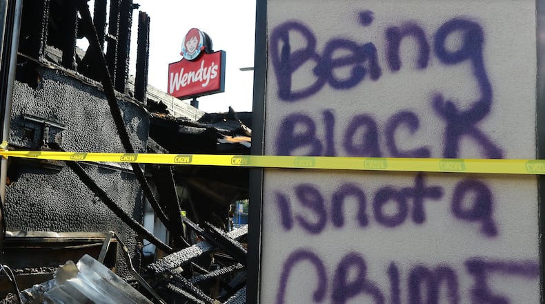 The Atlanta Wendy’s where Rayshard Brooks, a 27-year-old black man, was shot and killed by Atlanta police Friday evening during a struggle in the drive-thru line is seen on Monday, June 15, 2020, in Atlanta.