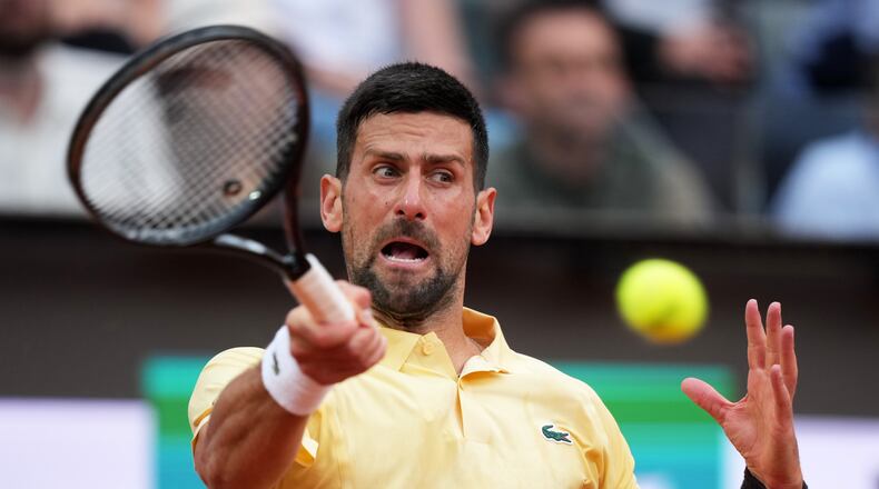 Serbia's Novak Djokovic returns the ball to Croatia's Dino Prizmic during their match at the Italian Open tennis tournament, in Rome, Friday, May 8, 2026. (AP Photo/Andrew Medichini)
