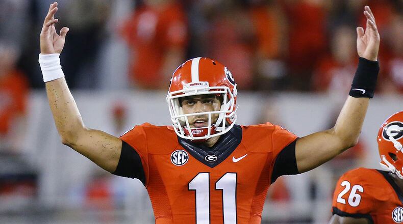 Georgia quarterback Greyson Lambert might lead the Bulldogs to a championship. Emphasis on "might." Curtis Compton / ccompton@ajc.com