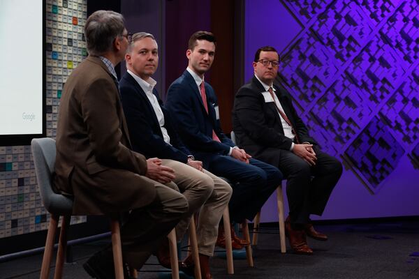 Atlanta Journal-Constitution government reporter Mark Niesse (far left) moderates a discussion with Georgia Republican Party Chairman Josh McKoon and Democratic Party of Georgia First Vice Chair Matthew Wilson about campaigns and cybersecurity at a summit Google hosted Tuesday. (Natrice Miller/ Natrice.miller@ajc.com)