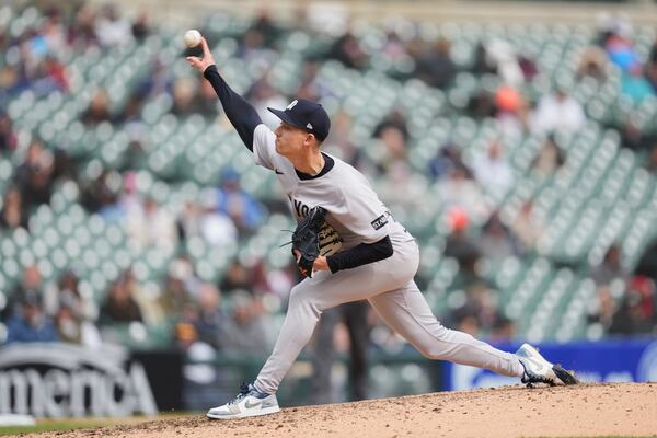 New York Yankees pitcher Luke Weaver throws against the Detroit Tigers in the eighth inning during a baseball game, Wednesday, April 9, 2025, in Detroit. (AP Photo/Paul Sancya)