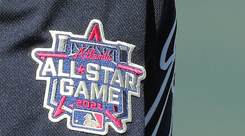 All-Star game patch adorns the jersey of outfielder Ronald Acuna during the first full squad workout Tuesday, Feb. 23, 2021, at CoolToday Park in North Port, Fla. The patch was removed from the Braves' uniforms after the league moved the game from Atlanta. (Curtis Compton / Curtis.Compton@ajc.com)