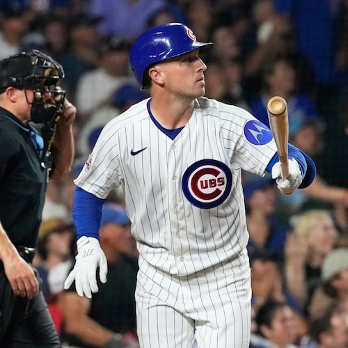 Chicago Cubs' Alex Bregman, right, watches his solo home run during the fourth inning of a baseball game against the Milwaukee Brewers in Chicago, Monday, Aug. 31, 2026. (AP Photo/Nam Y. Huh)