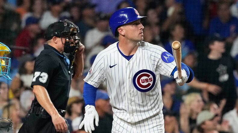 Chicago Cubs' Alex Bregman, right, watches his solo home run during the fourth inning of a baseball game against the Milwaukee Brewers in Chicago, Monday, Aug. 31, 2026. (AP Photo/Nam Y. Huh)