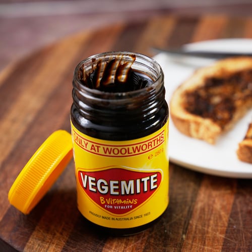 A piece of toast is prepared with Vegemite in Sydney, Australia, Monday, Nov. 17, 2025. (AP Photo/Rick Rycroft)