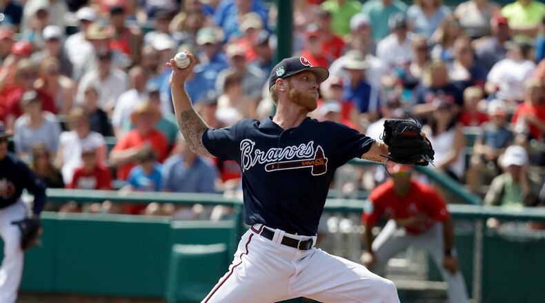 Atlanta Braves starting pitcher Mike Foltynewicz (26) throws in the first inning against the St. Louis Cardinals in a spring training baseball game, Tuesday, Feb. 28, 2017, in Kissimmee, Fla. (AP Photo/John Raoux)