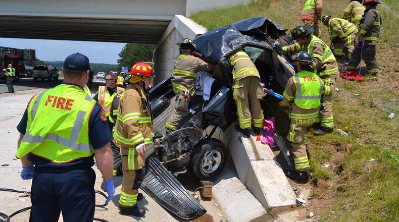 A 5-month-old baby was among three people injured in a Thursday afternoon crash in Woodstock.