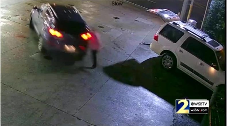 Surveillance footage shows the dramatic moment a mother fought back against a purse snatcher.