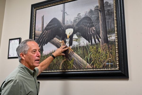 Not only is Steve Hein director of Georgia Southern’s Center for Wildlife Education, he also is an artist. He painted Freedom in 2006. (Sarah Peacock for the AJC)