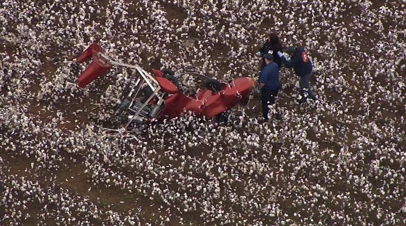The pilot was in a gyrocopter when it crashed and landed in a cotton field.