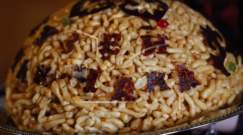 In this picture taken on Thursday, June 21, 2018, a traditional chak-chak is displayed during the 2018 soccer World Cup at the Chak-Chak museum in Kazan, Russia. There is arguably more chak-chak on offer in Kazanâs shops, cafes and restaurants than football fans attending soccer World Cup matches in the Tatarstan capital. The Tatar dessert that is traditionally eaten at weddings has become a symbol of the autonomous region known as the âLand of 1,001 Delights.â (AP Photo/Frank Augstein)