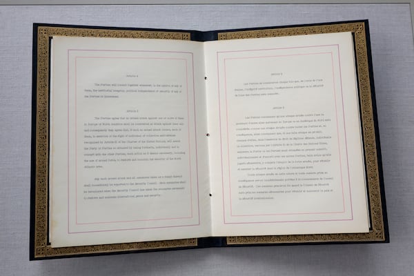 FILE - The Washington Treaty on display during a ceremony to mark the 75th anniversary of NATO at NATO headquarters in Brussels, Thursday, April 4, 2024. (AP Photo/Geert Vanden Wijngaert, File)
