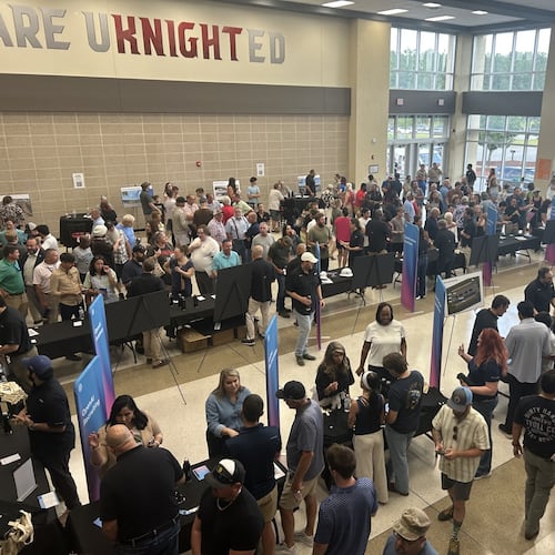 Savannah-area residents packed the Effingham College and Career Academy atrium Thursday, July 23, 2026, for the OpenAI data center open house. (Adam Van Brimmer/AJC)