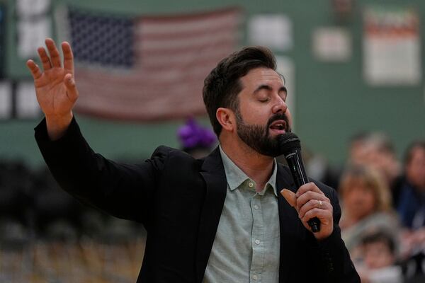 River Church Cincinnati pastor Cory Bowman, who is Vice President JD Vance's half brother and Cincinnati mayoral candidate, preaches during Easter worship service in the Hays Porter Elementary School gym Sunday, April 20, 2025, in Cincinnati. (AP Photo/Carolyn Kaster)