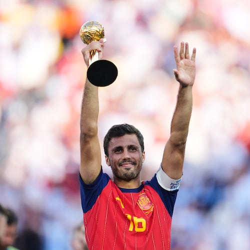 Spain's Rodri celebrates with the tournament's best player award after the World Cup final soccer match between Spain and Argentina in East Rutherford, N.J., near New York, Sunday, July 19, 2026. (AP Photo/Abbie Parr)
