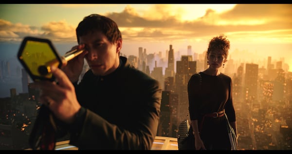 Adam Driver, left, and Nathalie Emmanuel in director Francis Ford Coppola’s "Megalopolis." (Courtesy of American Zoetrope/Megalopolis/Mihai Malaimare Jr.)