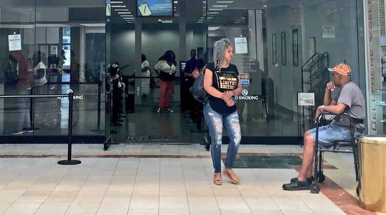 Customers wait to be helped at a Georgia Department of Driver Services office in Decatur.