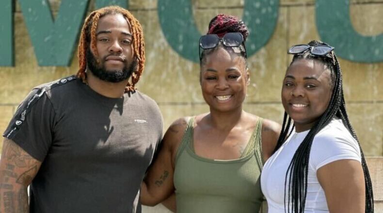 Treyvon Vallery (from left), his mother Kenisha and his sister. Treyvon was fatally shot Feb. 28. His girlfriend and her father have been charged in the incident.