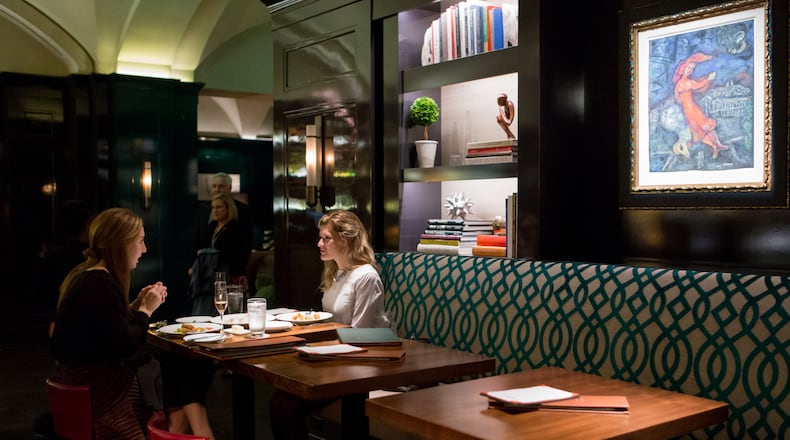 Martina Montalbetti and Kaylee Berrong dine at the Atlas Restaurant at the St. Regis Hotel in Buckhead.
