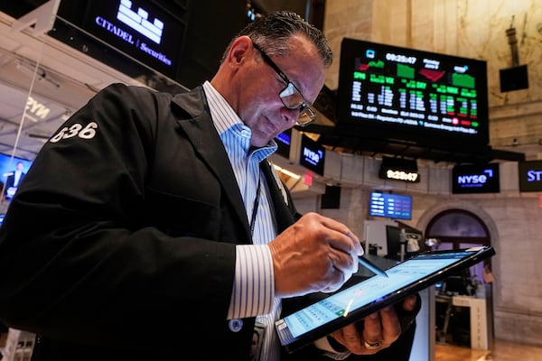 Trader Edward Curran works on the floor of the New York Stock Exchange, Monday, June 9, 2025. (AP Photo/Richard Drew)