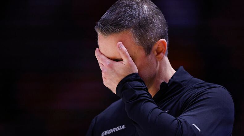 Georgia coach Mike White reacts to a play during the first half of the team's NCAA college basketball game against Tennessee, Wednesday, Jan. 25, 2023, in Knoxville, Tenn. (AP Photo/Wade Payne)