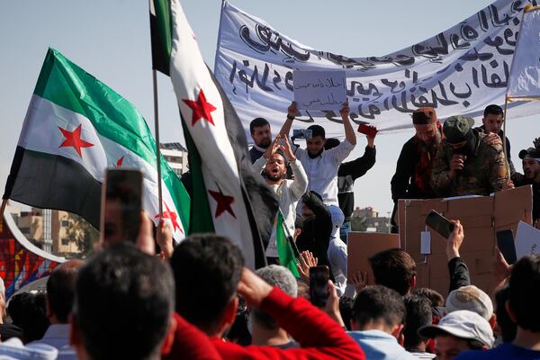 Supporters of Syria's new government gather after the prayer in Umayyad square in Damascus, Syria, Friday March 14, 2025.(AP Photo/Omar Sanadiki)