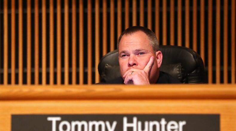 Gwinnett County Commissioner Tommy Hunter at a recent Board of Commissioners meeting. HENRY TAYLOR / HENRY.TAYLOR@AJC.COM