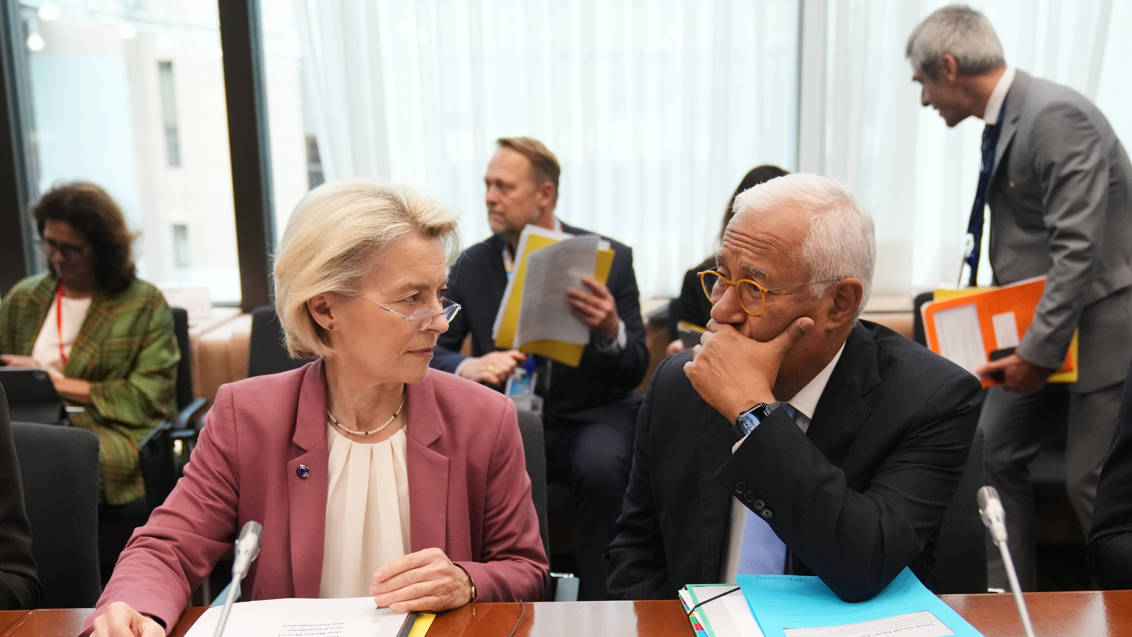European Commission President Ursula von der Leyen, left, and European Council President Antonio Costa wait for the start of the Tripartite Social Summit at the European Council building in Brussels, Wednesday, Oct. 22, 2025. (AP Photo/Virginia Mayo)
