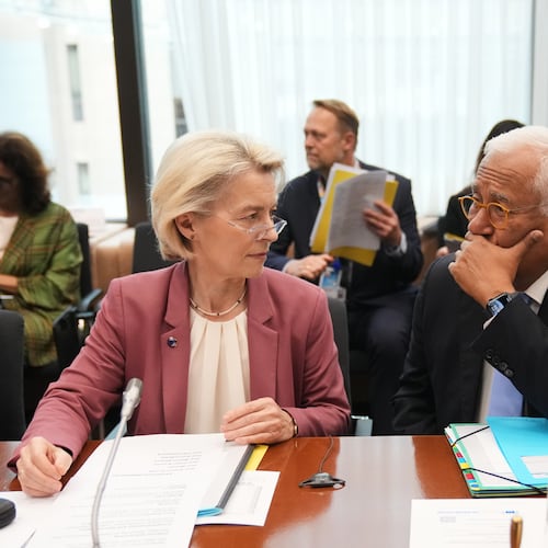 European Commission President Ursula von der Leyen, left, and European Council President Antonio Costa wait for the start of the Tripartite Social Summit at the European Council building in Brussels, Wednesday, Oct. 22, 2025. (AP Photo/Virginia Mayo)