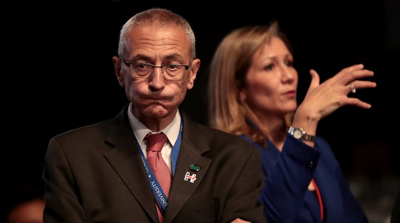 HEMPSTEAD, NY - SEPTEMBER 26: Democratic presidential nominee Hillary Clinton's Campaign Chairman John Podesta (L) looks on prior to the start of the Presidential Debate at Hofstra University on September 26, 2016 in Hempstead, New York. The first of four debates for the 2016 Election, three Presidential and one Vice Presidential, is moderated by NBC's Lester Holt. (Photo by Drew Angerer/Getty Images)