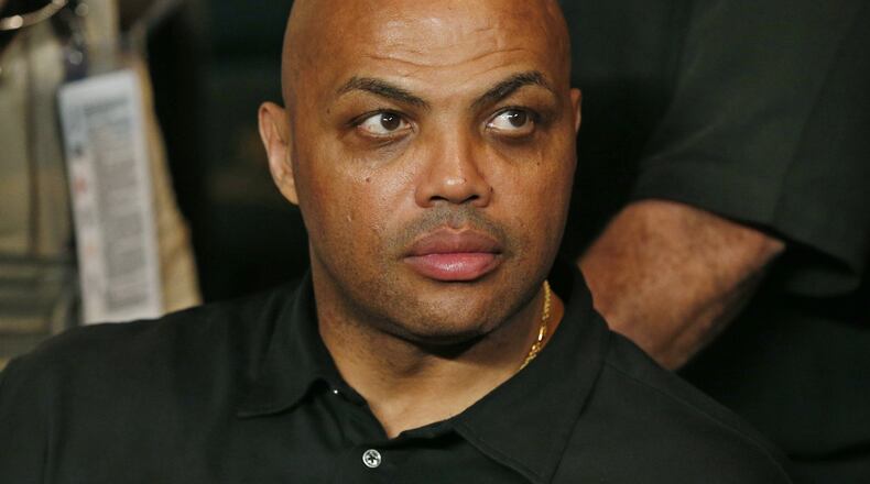 FILE - In this May 2, 2015, file photo, Charles Barkley joins the crowd before the start of the world welterweight championship bout between Floyd Mayweather Jr., and Manny Pacquiao in Las Vegas. Barkley calls it friendly fire, the criticism a rich black gets for talking about race from fellow blacks who believe he can't understand their struggles. But the basketball Hall of Famer and TNT analyst says he can handle it, and hopes he can create conversation that makes a difference beyond the things he's already doing when his show "The Race Card" debuts in 2017. (AP Photo/John Locher, File)