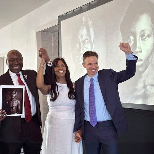 FILE - Susanna Moore, left, the great-great-great-granddaughter of Harvard biologist Louis Agassiz, celebrates with Tamara Lanier, second right, and attorneys Ben Crump and Josh Koskoff at the Boston Marriott Long Wharf hotel, May 28, 2025, in Boston, Mass. (AP Photo/Leah Willingham, File)