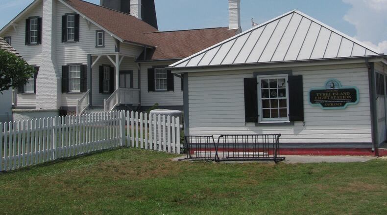 The Tybee Island Lighthouse is among the many sights to gawk at during the Critz Tybee Run Fest’s unique five-races-in-one version of running a marathon. SUZANNE VAN ATTEN / SVANATTEN@AJC.COM