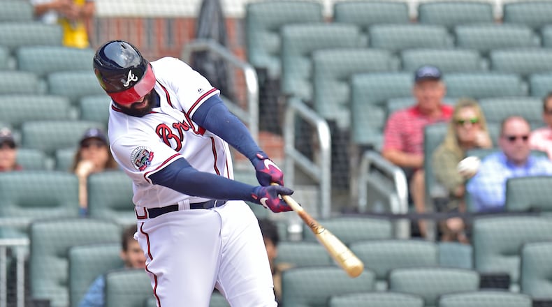 A few fans watch Matt Kemp hit a first-inning two-run home run against the Rangers at SunTrust Park on Wednesday.