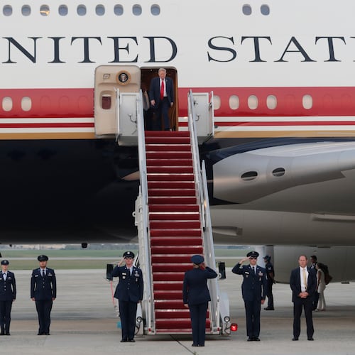 President Donald Trump walks down the stairs of Air Force One upon his arrival at Joint Base Andrews, Md., Sunday, July 19, 2026. (AP Photo/Luis M. Alvarez)